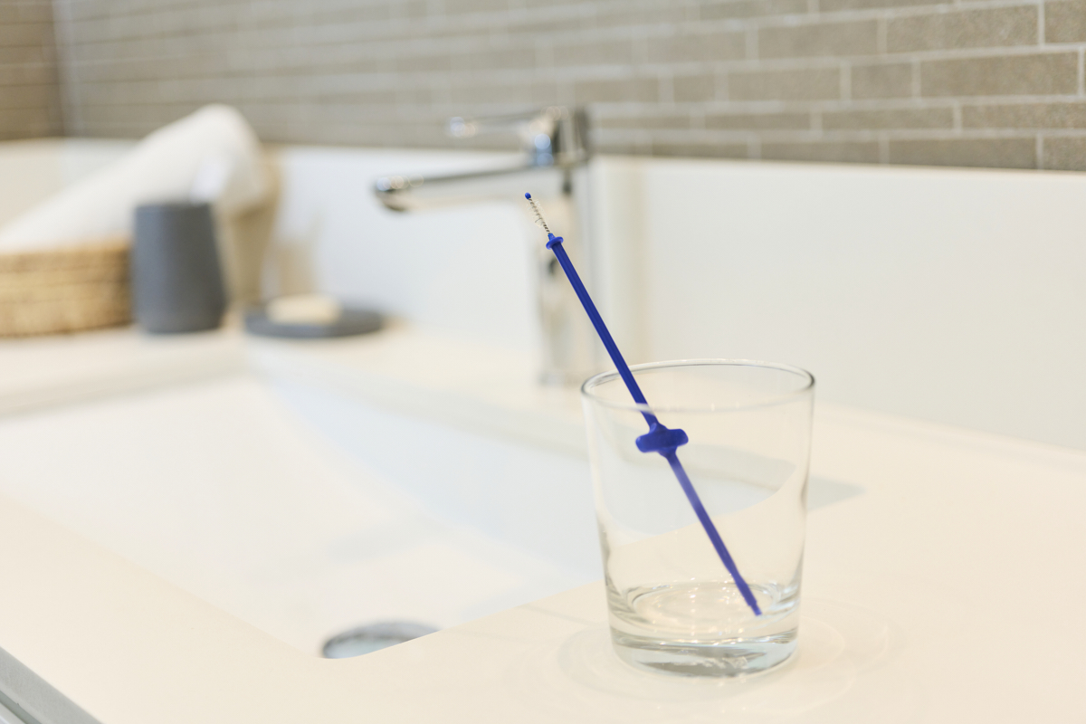 woman cleaning stoma maintenance